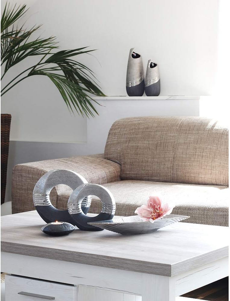 Dekohelden24 Edle Moderne Deko Designer Keramik Vase rund geschwungen mit Loch in Silber-grau, 23 cm