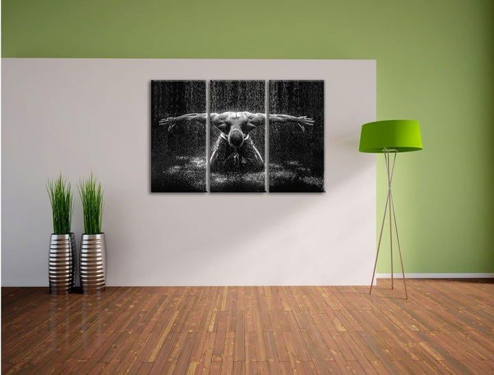 Pixxprint Bodybuilder im Regen Kunst B&W / 3-Teilig/Gesamtmass 120cm Leinwandbild bespannt auf Holzr