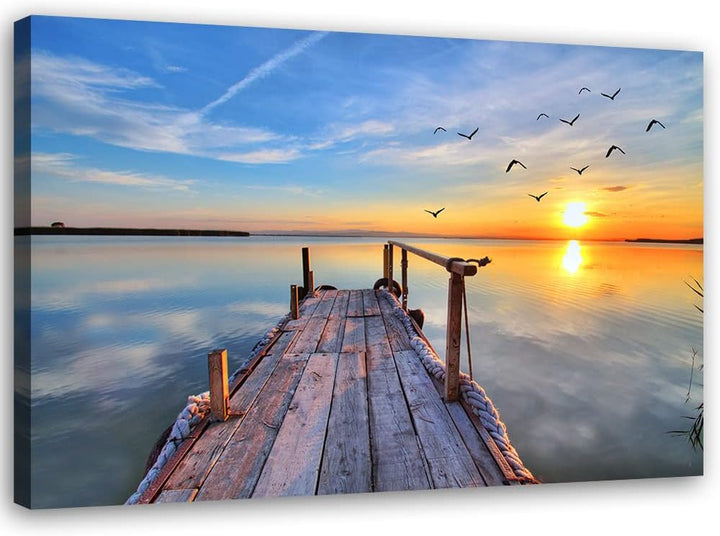 Feeby Vlies Leinwandbild Sonnenuntergang See Strand Holzsteg 90x60 cm Druckbild Wandbild Wanddekorat